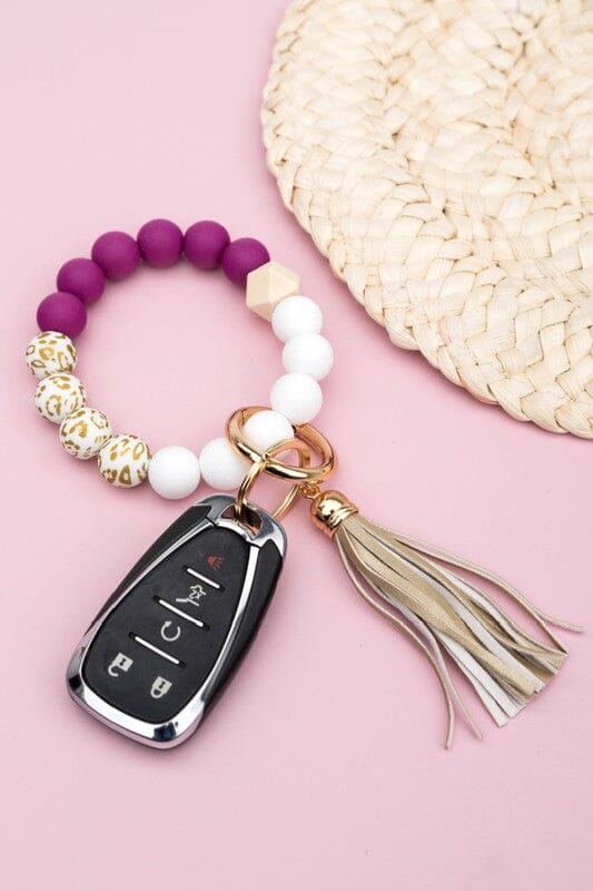 REDAPRIC keychain beaded bracelet for women,silicone car key ring wristlet  with Soft nylon tassel，beads bangle key chain for gift (pink) at Amazon  Women's Clothing store